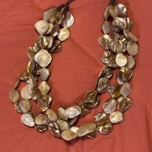 Elegant Mother of Pearl Vintage Shell Necklace in Natural Tones. 16-18”
4 Strand